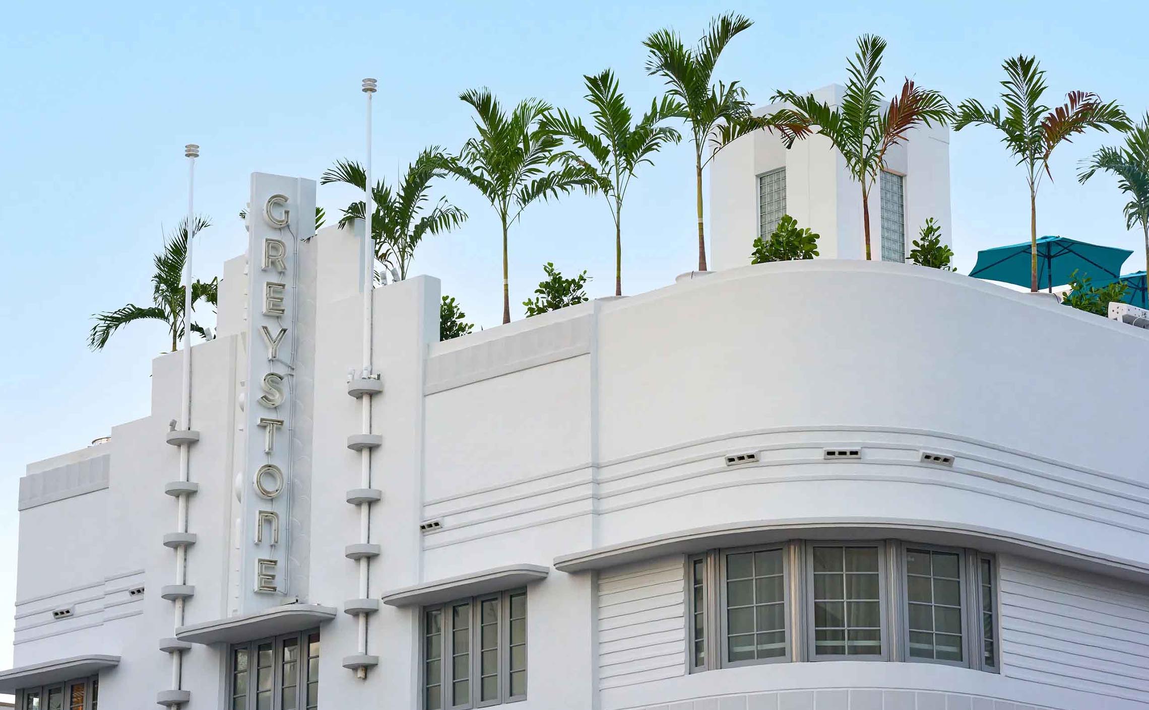 Greystone Hotel Building Focus on Neon Sign on the Facade