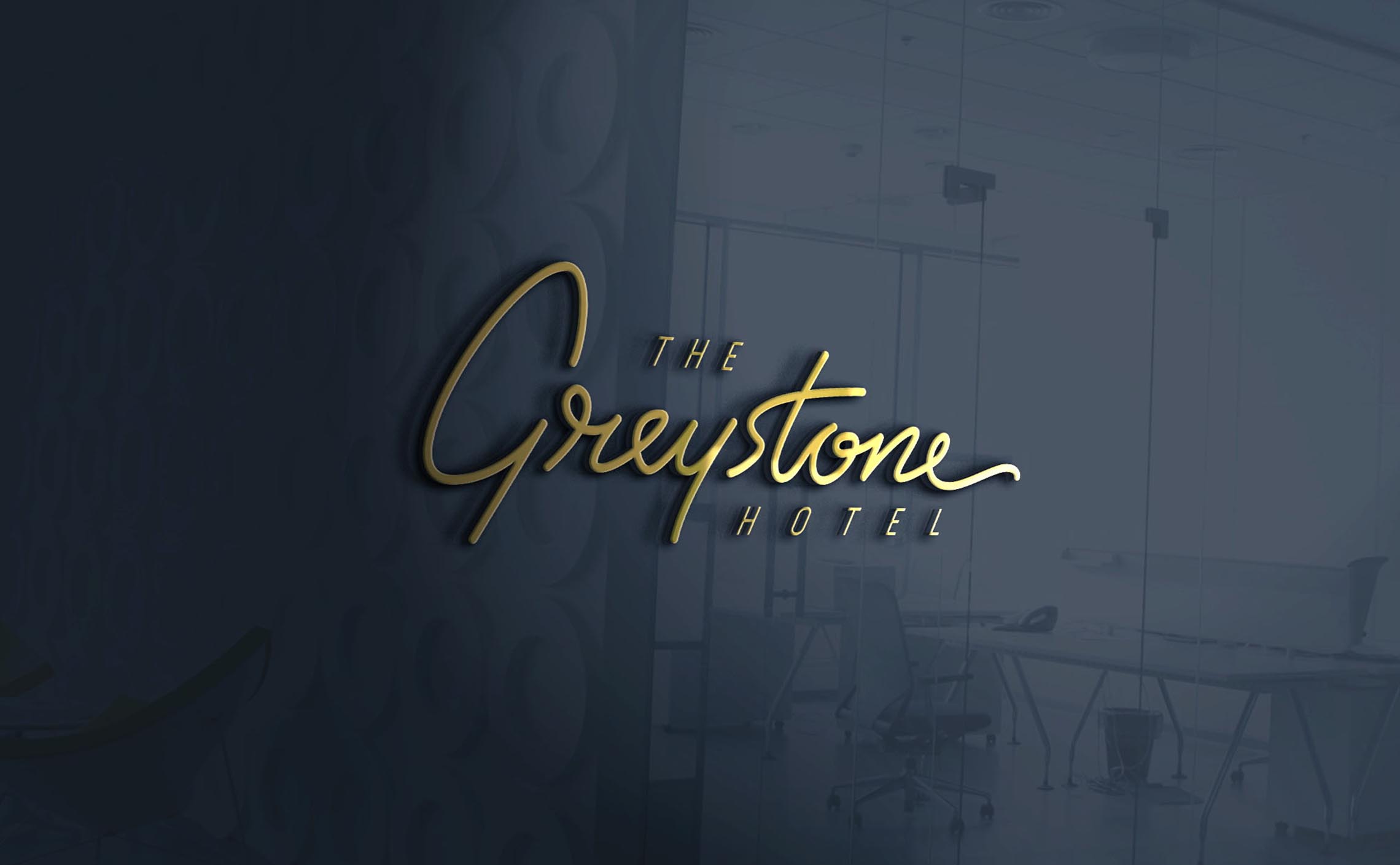Unused alternative Greystone logo in a monoline handlettering style displayed as a mockup on a glass wall