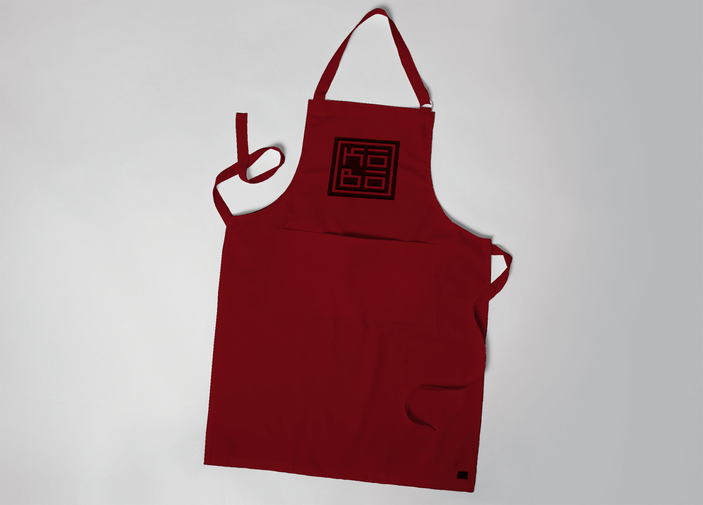 Red Apron with Kobo logo embroidered