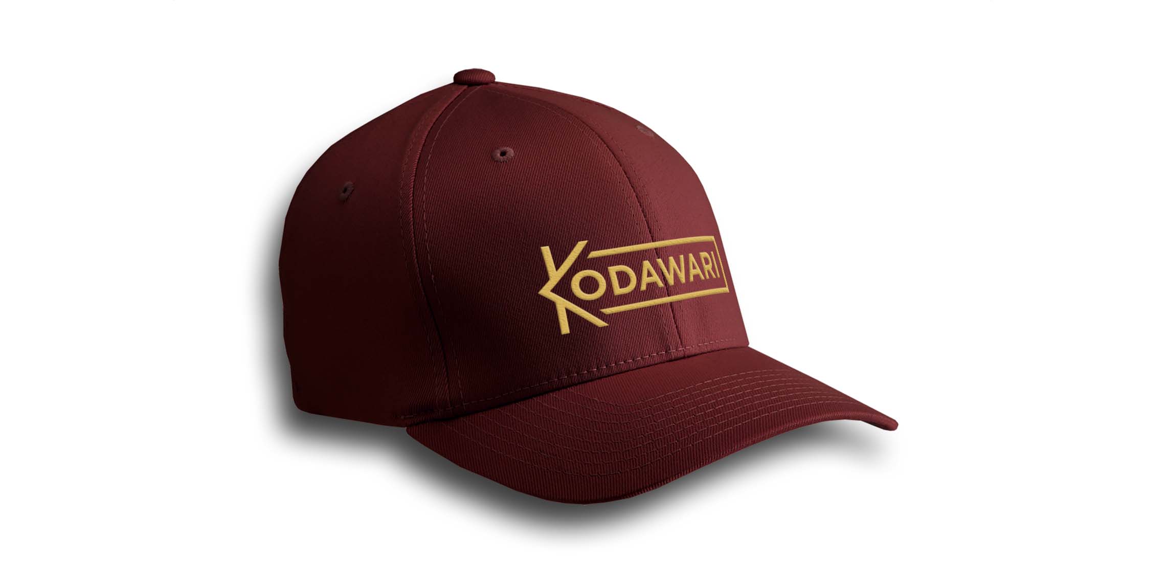 Dark red baseball cap embroidered with a golden Kodawari Logo