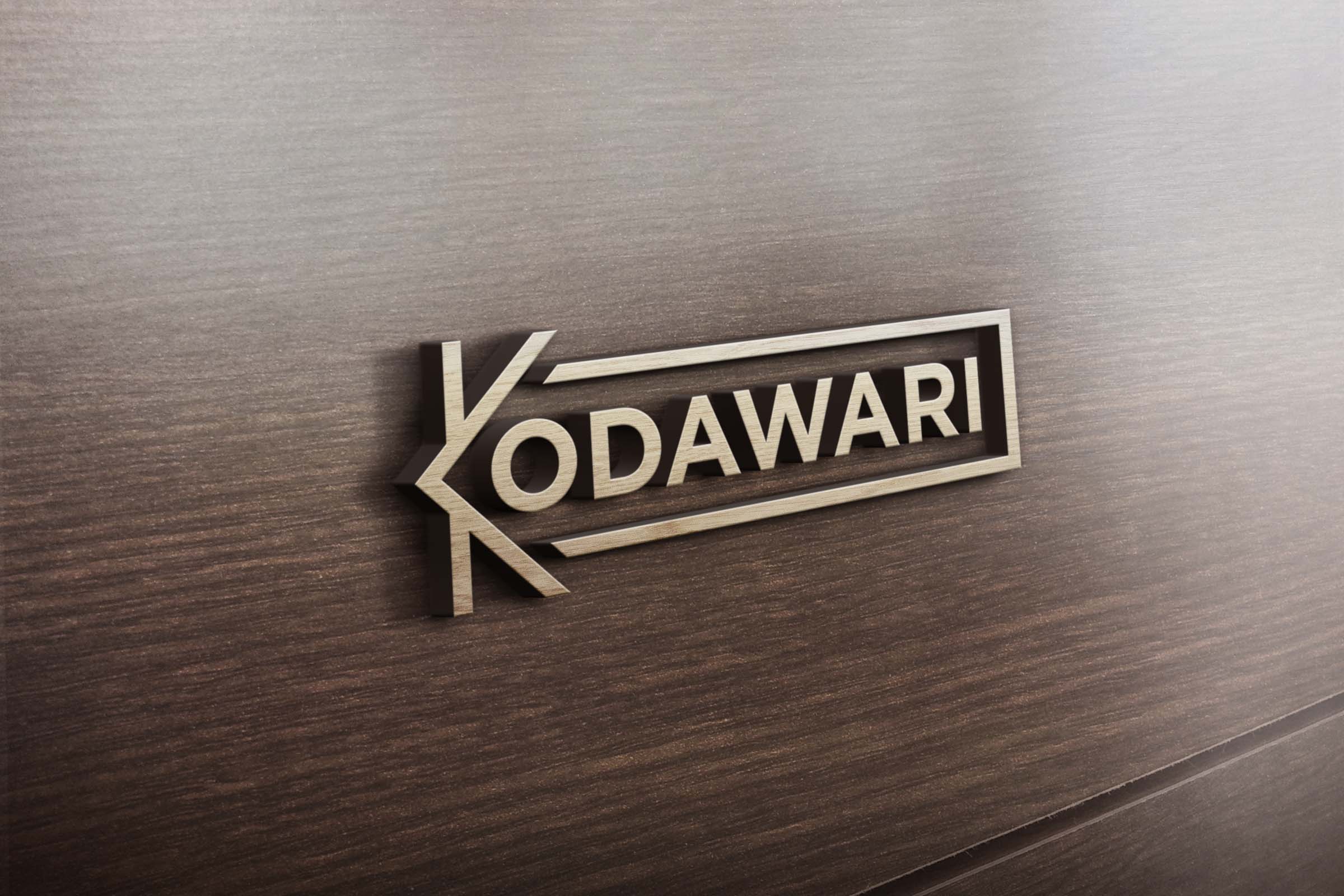 Kodawari Logo carved onto wood wall
