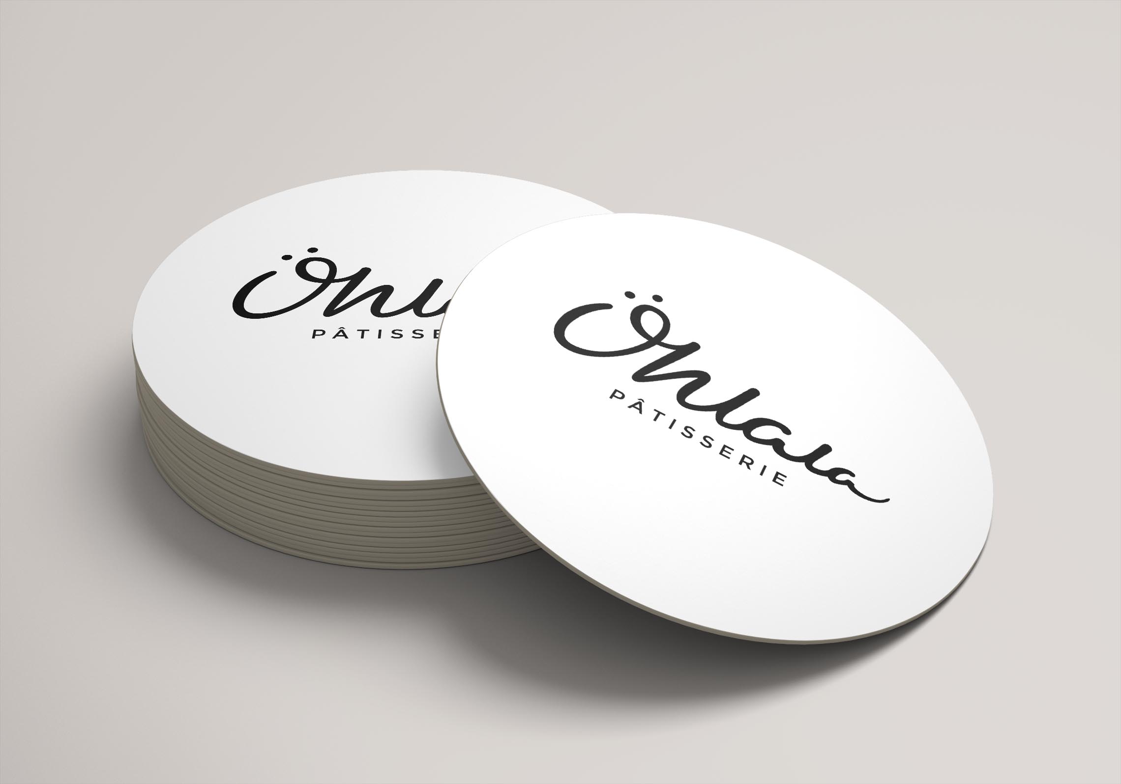 Ohlala branded white coasters